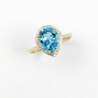 Pear Swiss Blue Topaz with Diamond Ring in 14K Yellow Gold